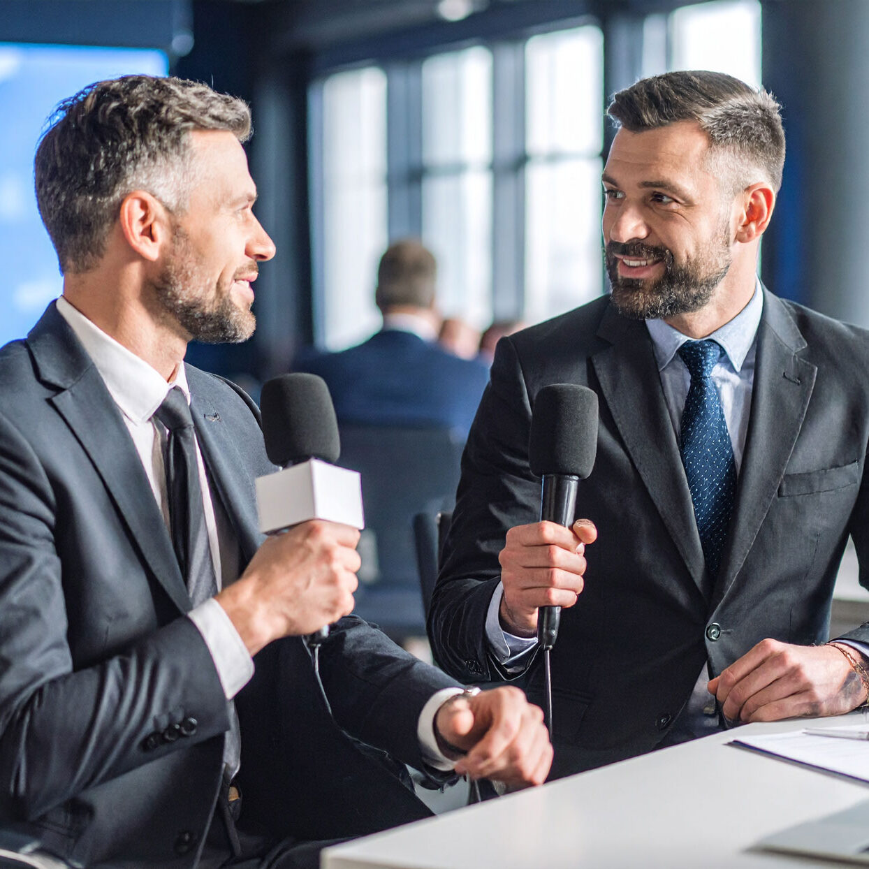 military-man-and-a-business-man-getting-interviewed-at-a-tv-show-studio military-man-and-a-business-man-getting-interviewed-at-a-tv-show-studio